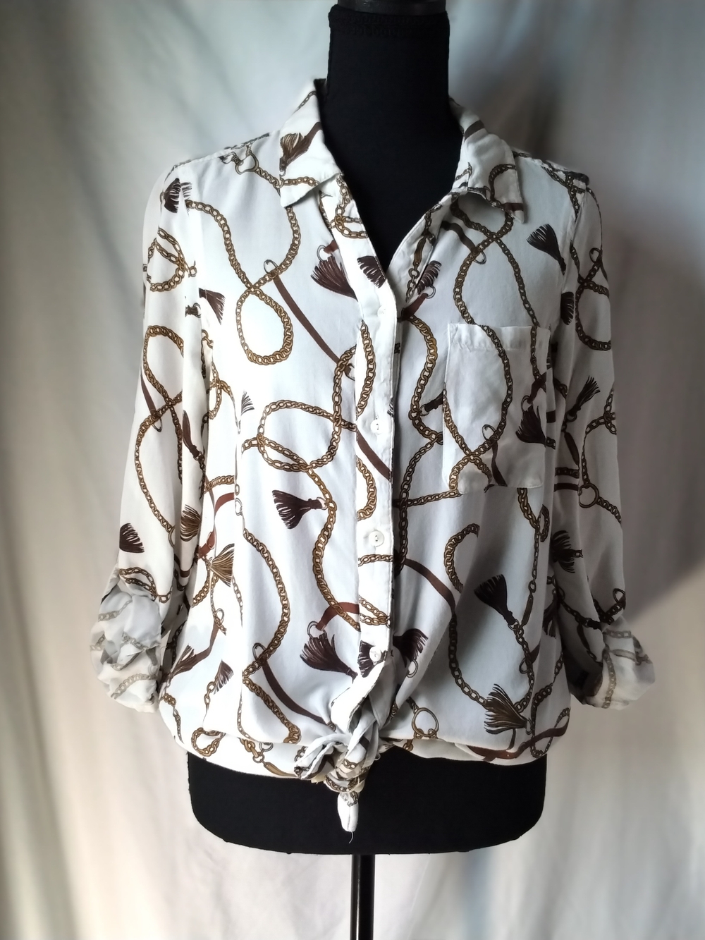 intro. White Button-Down Top with Brown Chain & Tassel Print